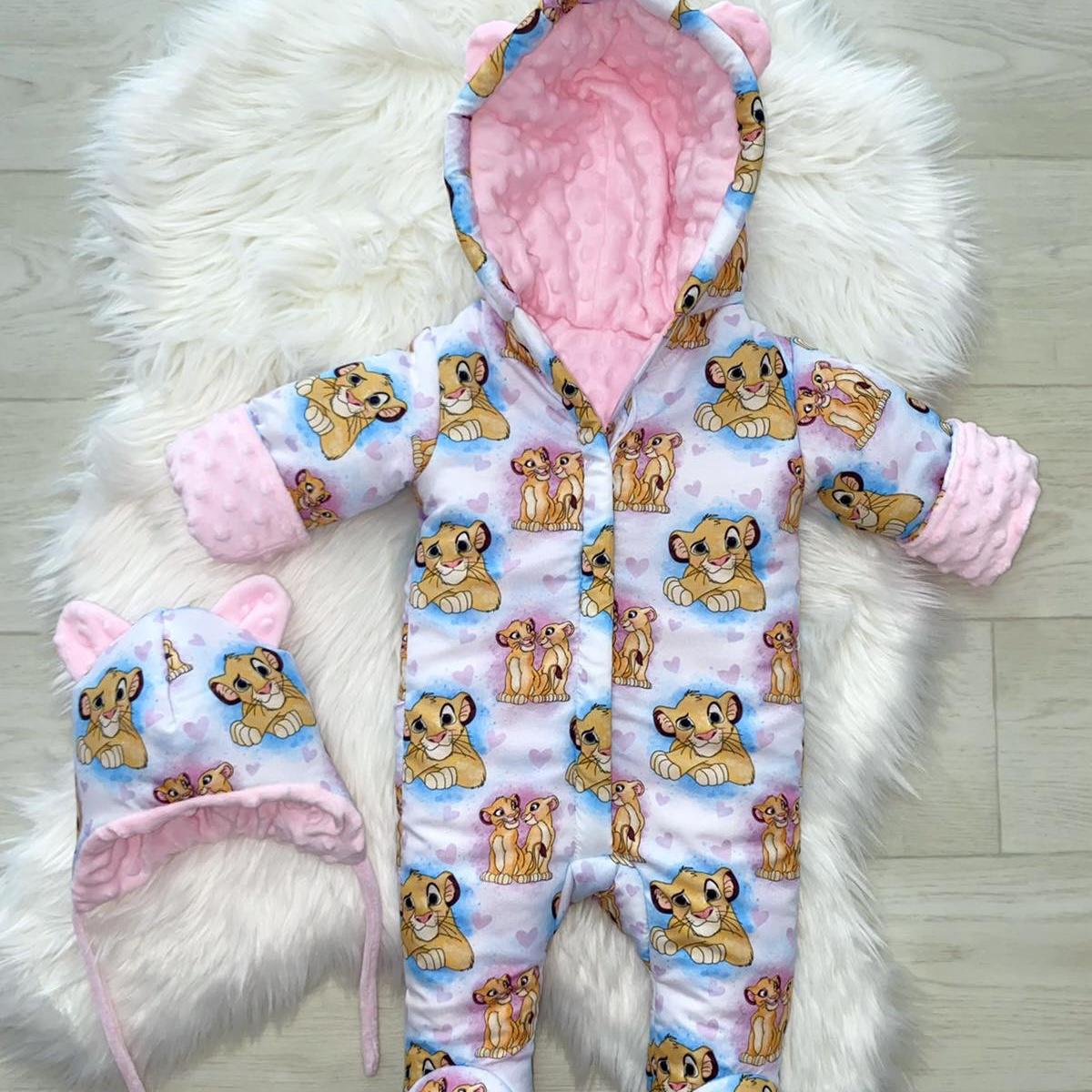 Winter onesie with the Lion King print and pink cream nala