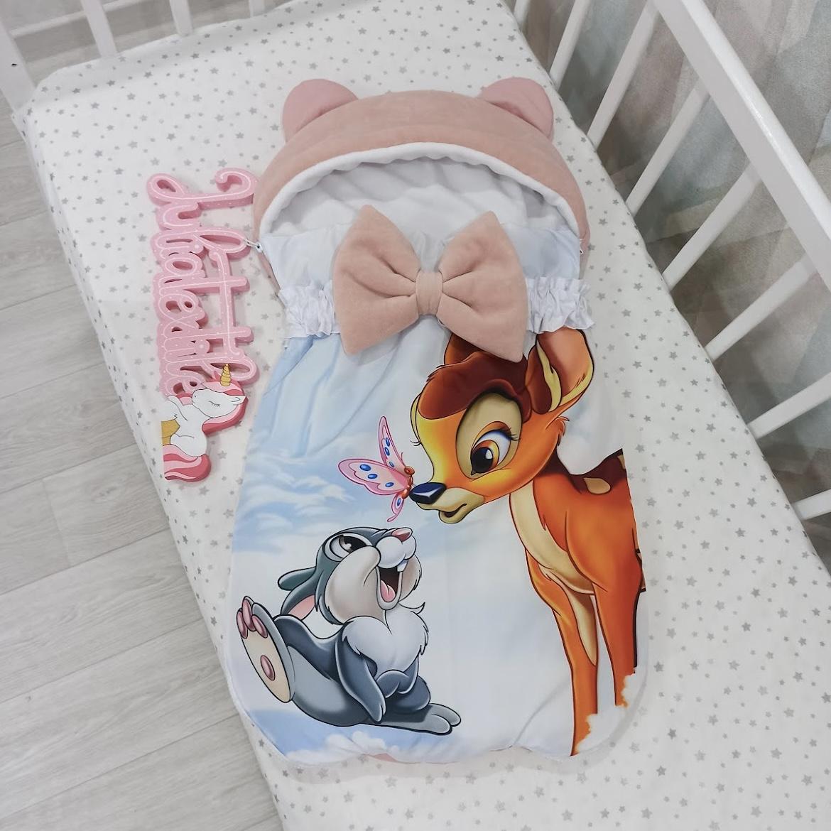 Sleeping bag with bambi print and old pink white tambourine