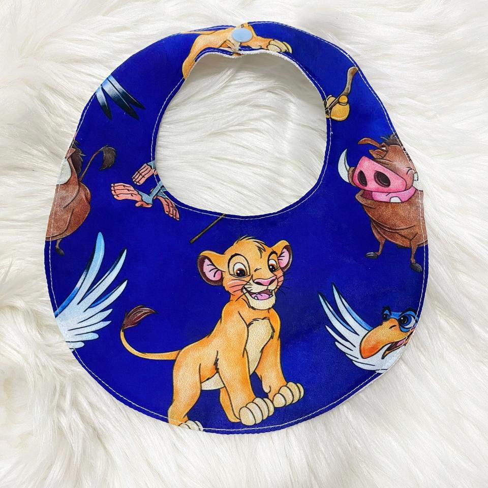 Bib with blue Timon and Simba print