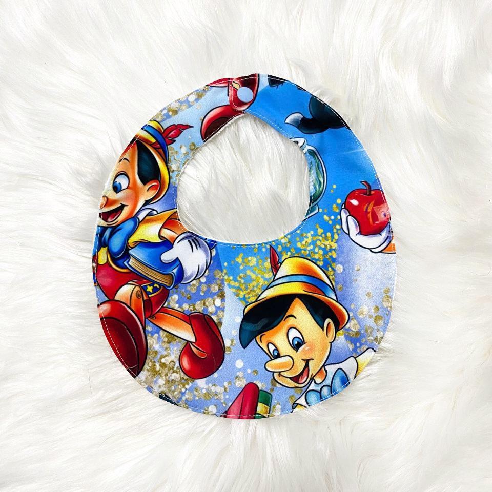 Bib with blue red Pinocchio print