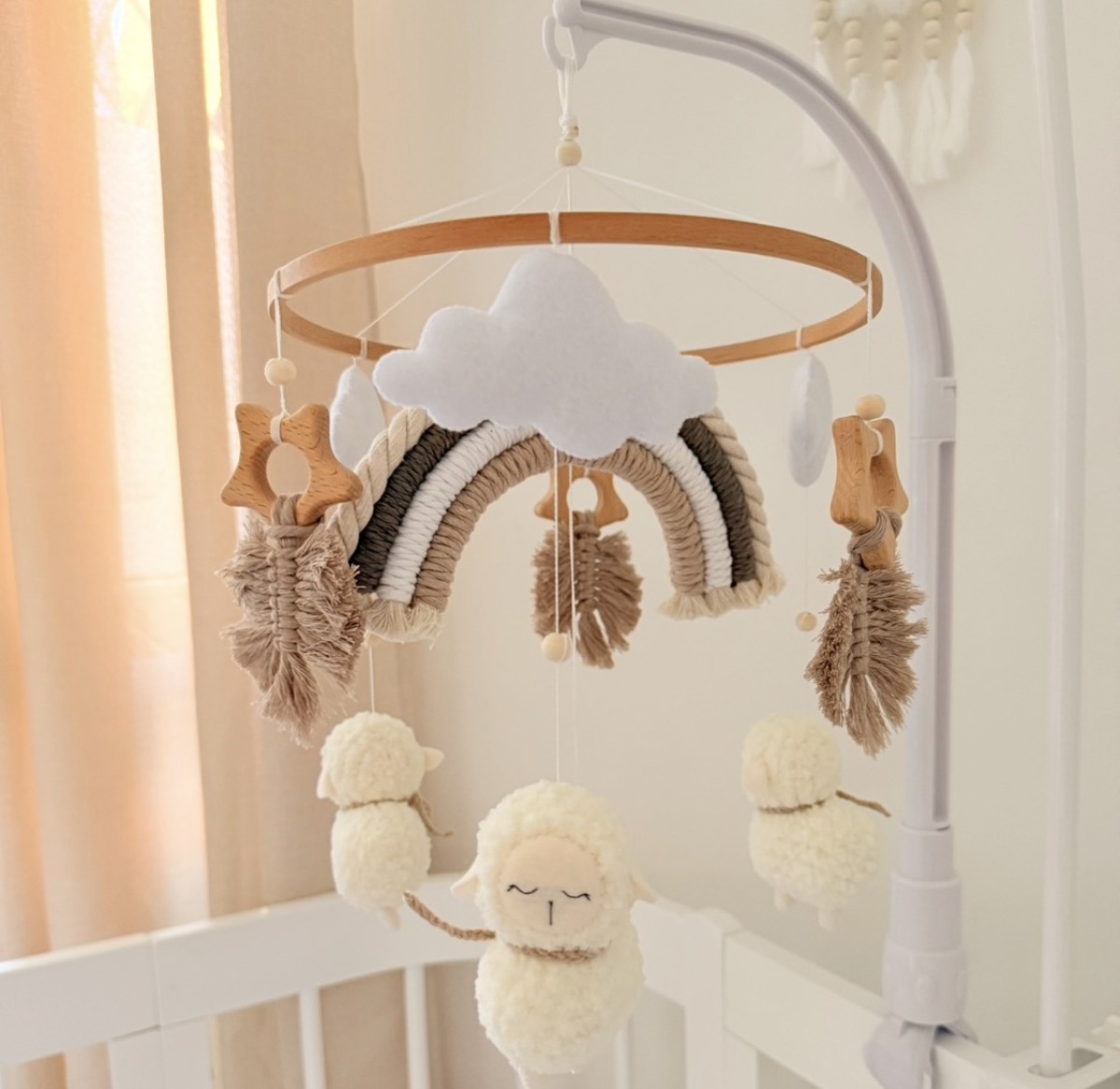 Sheep and rainbow musical mobile