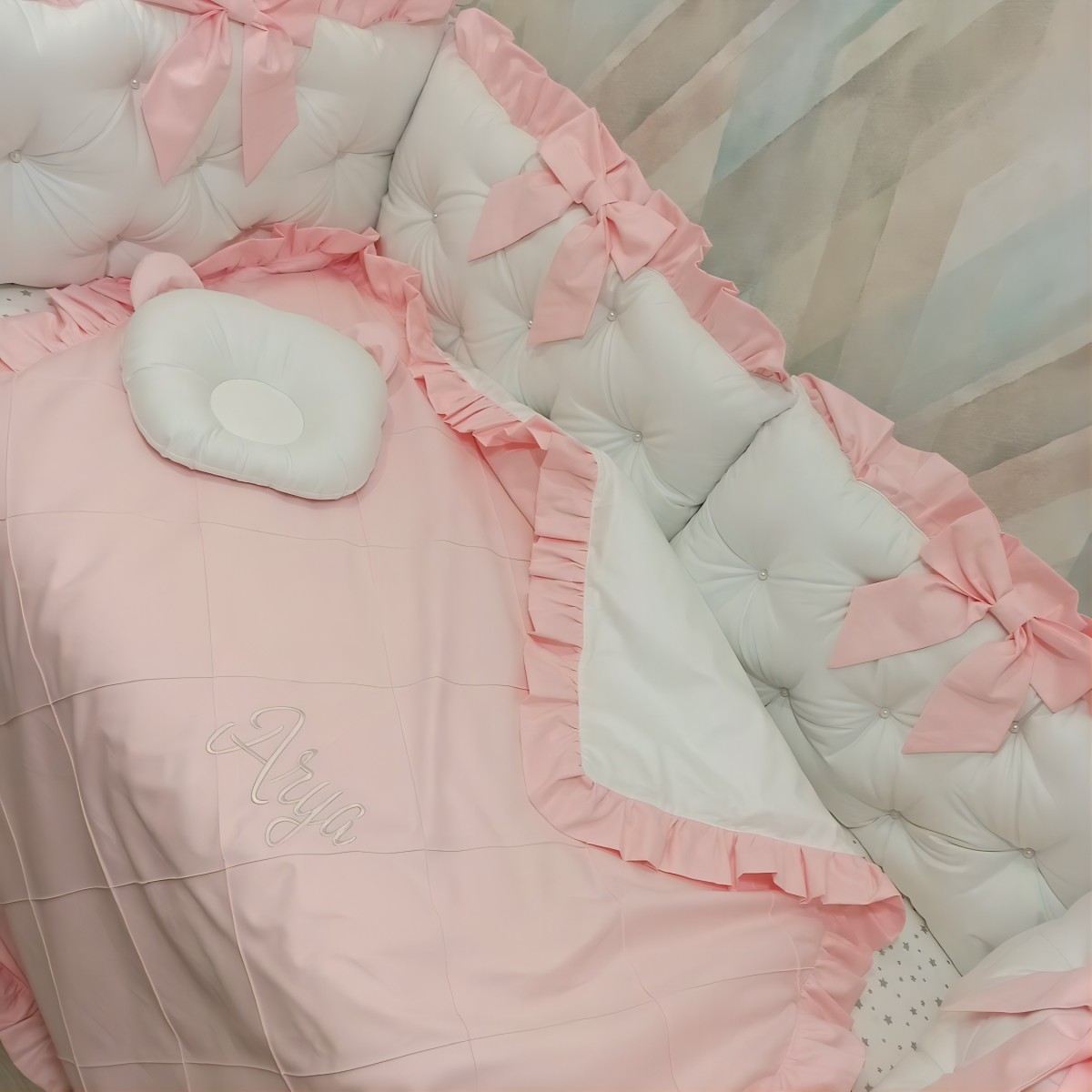 Elegant Classic Pink Baby Cot Bedding with Decorative Pillows and Bows
